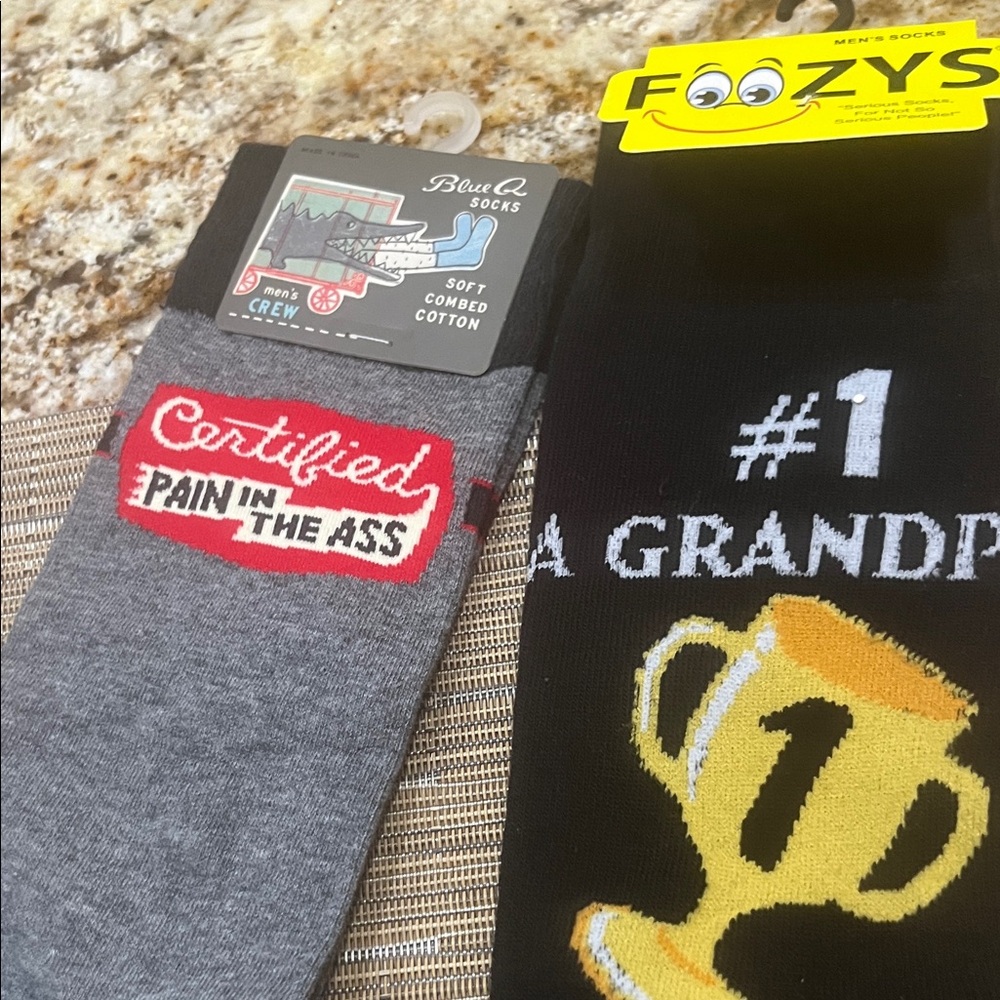 Two men’s themed socks nwt